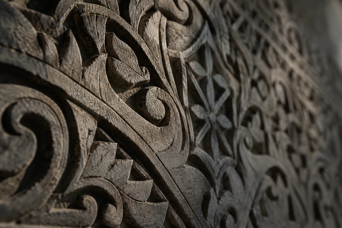 Contemporary decorative object placed between an archival reference and a modern interior