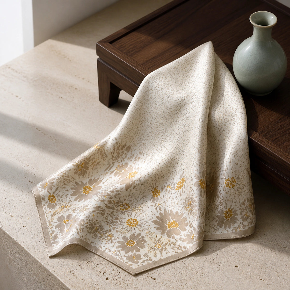 65 cm silk art scarf in an Eastern Aura museum editorial setting, travertine and walnut